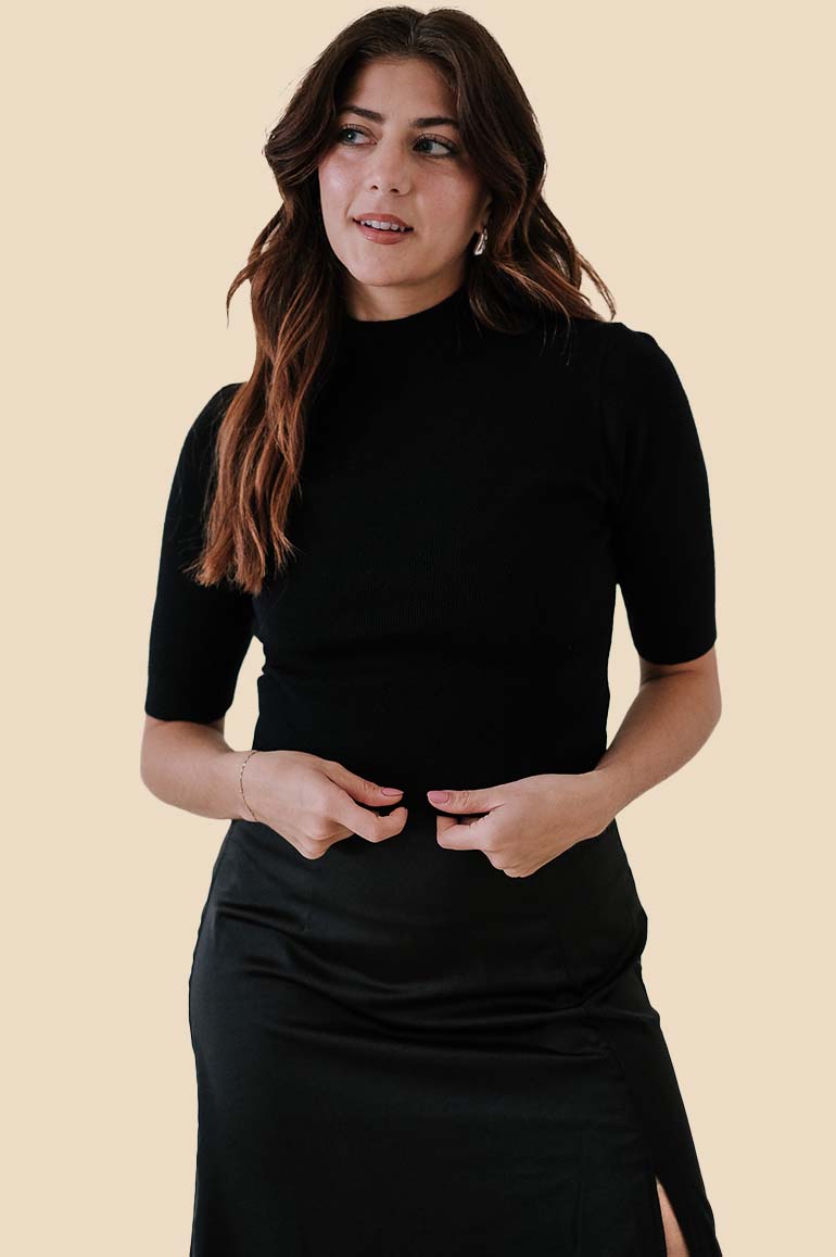 Black Sleeveless Turtleneck Knit Top